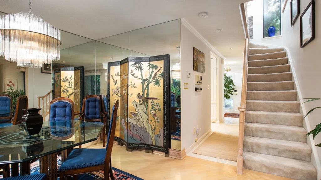 Dated Dining Room Floor-To-Ceiling Mirror Light Hardwood Floors