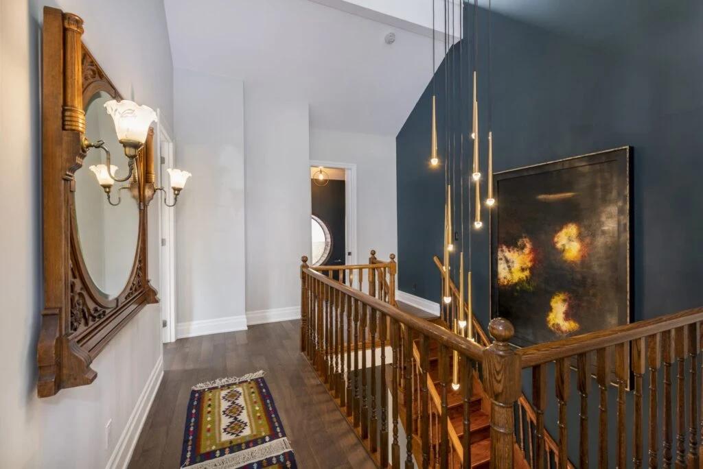 Dramatic Stair Renovation Dark And White Walls With Dark Wood Stairs And Luxury Lights