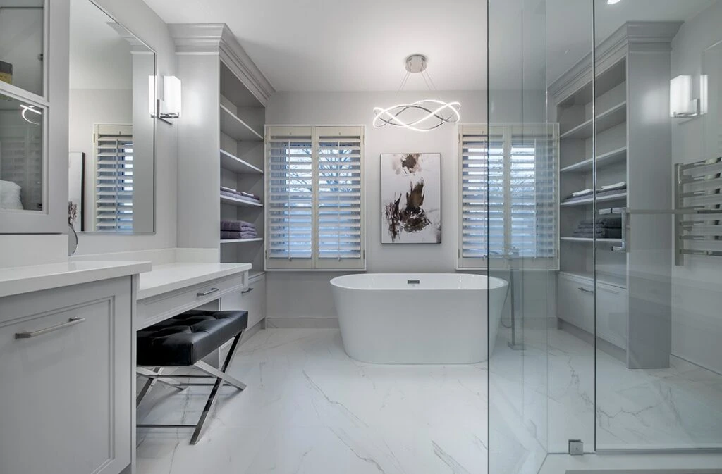 White Bathroom Renovation With LED Light Over Tub