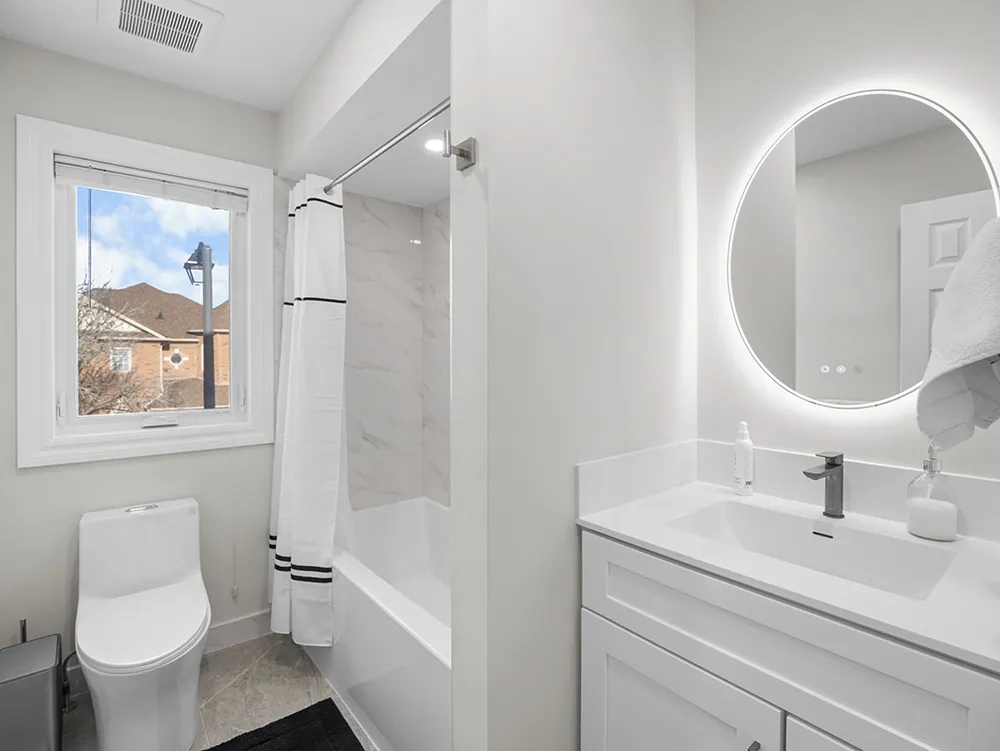 Shared Bathroom tub and vanity